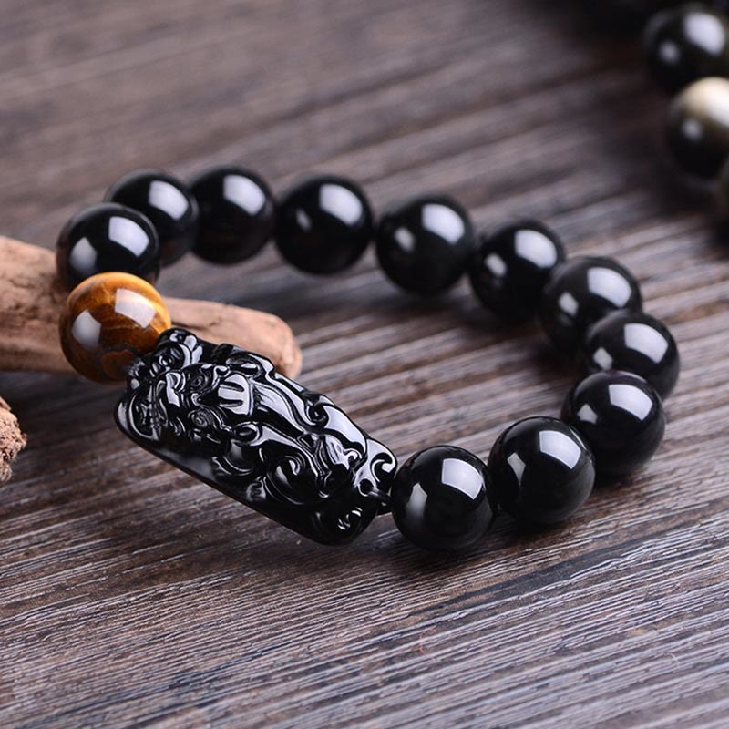 Braccialetto Buddha Stones in ossidiana nera naturale PiXiu Tiger's Eye Strength
