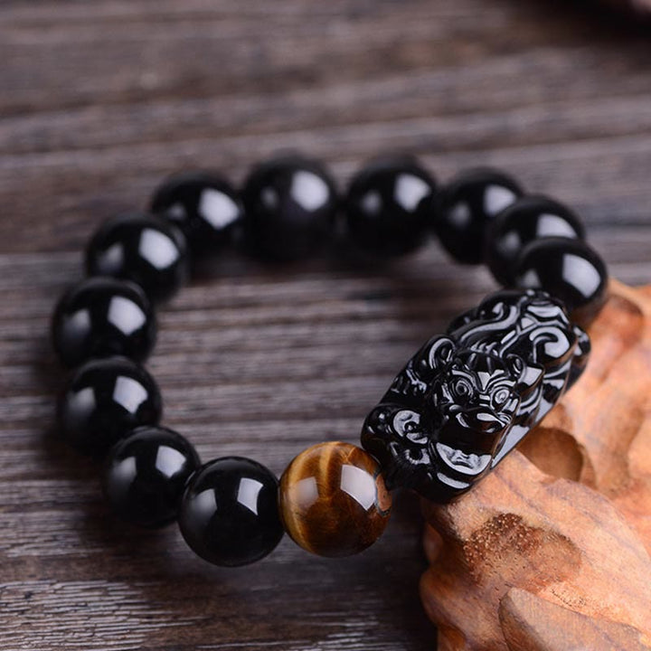 Braccialetto Buddha Stones in ossidiana nera naturale PiXiu Tiger's Eye Strength