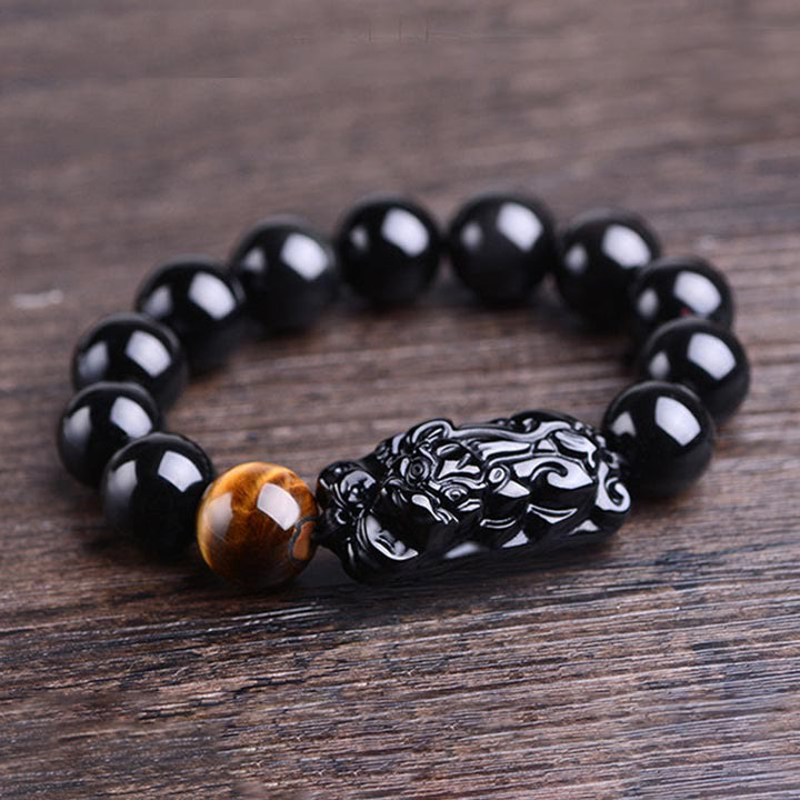 Braccialetto Buddha Stones in ossidiana nera naturale PiXiu Tiger's Eye Strength