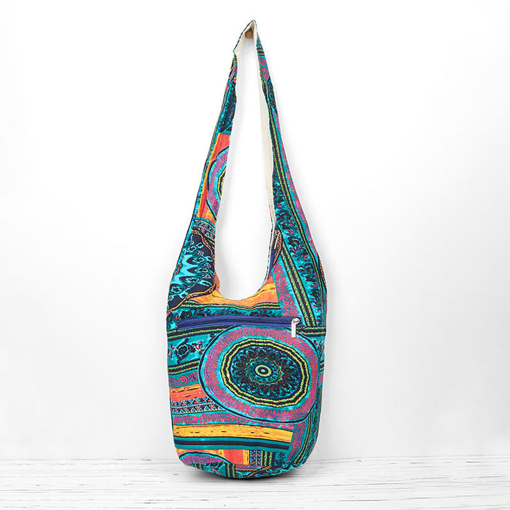 Borsa a tracolla in cotone con motivo a fiori blu Buddha Stones