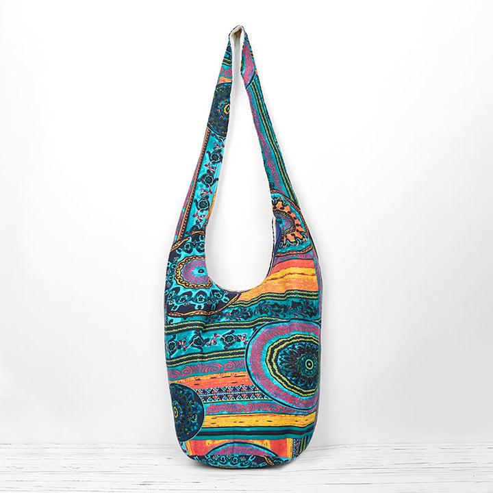 Borsa a tracolla in cotone con motivo a fiori blu Buddha Stones