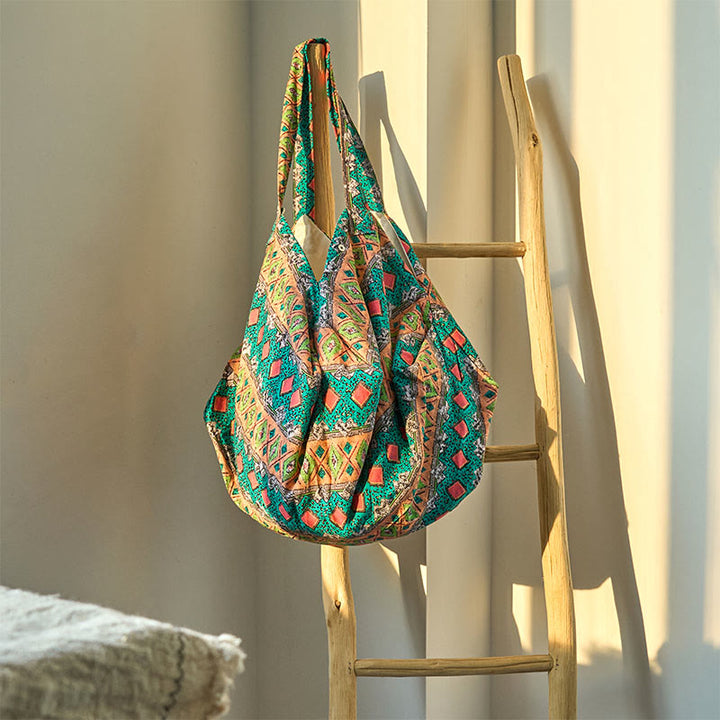 Borsa a tracolla in cotone con motivo a strisce colorate Buddha Stones