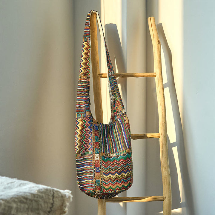 Borsa a tracolla in cotone con motivo a onde marroni e verdi Buddha Stones