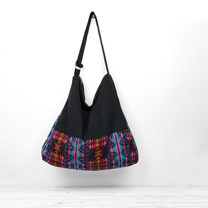 Borsa a tracolla in cotone con motivo geometrico rosso rosa e nero Buddha Stones