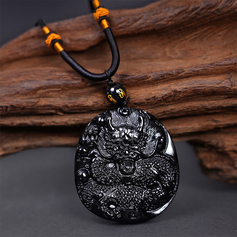 Collana con ciondolo di protezione in ossidiana nera naturale con drago intagliato rotondo in Buddha Stones - Drago 45mm*48mm - image 1