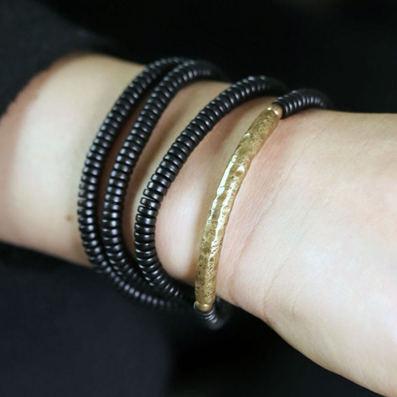 Bracciale multistrato in rame con perline di legno di ebano tibetano Buddha Stones