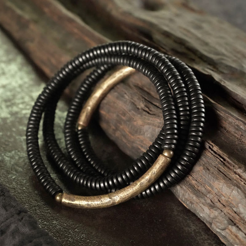 Bracciale multistrato in rame con perline di legno di ebano tibetano Buddha Stones