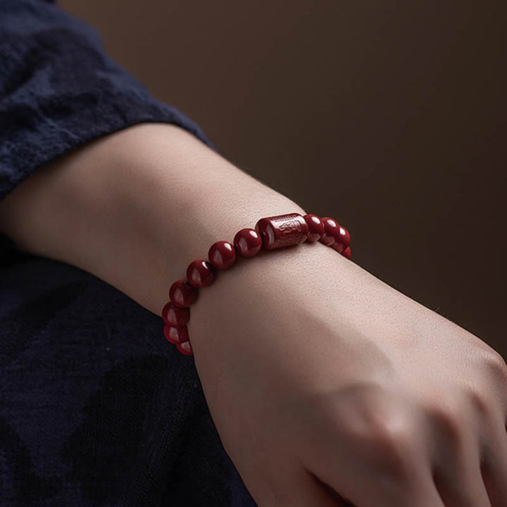 Braccialetto di benedizione del Sutra del cuore di cinabro naturale Buddha Stones