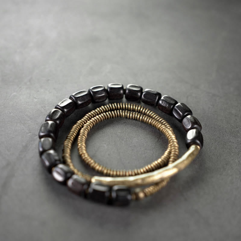 Braccialetto di guarigione multistrato in rame con perline di legno di ebano tibetano Buddha Stones vintage Peace