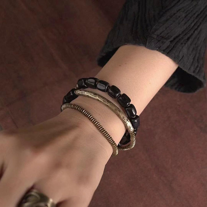 Braccialetto di guarigione multistrato in rame con perline di legno di ebano tibetano Buddha Stones vintage Peace