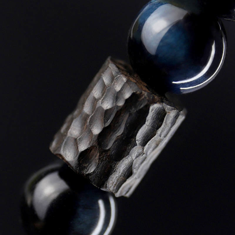 Braccialetto di perline di legno di ebano con occhio di tigre e Buddha Stones