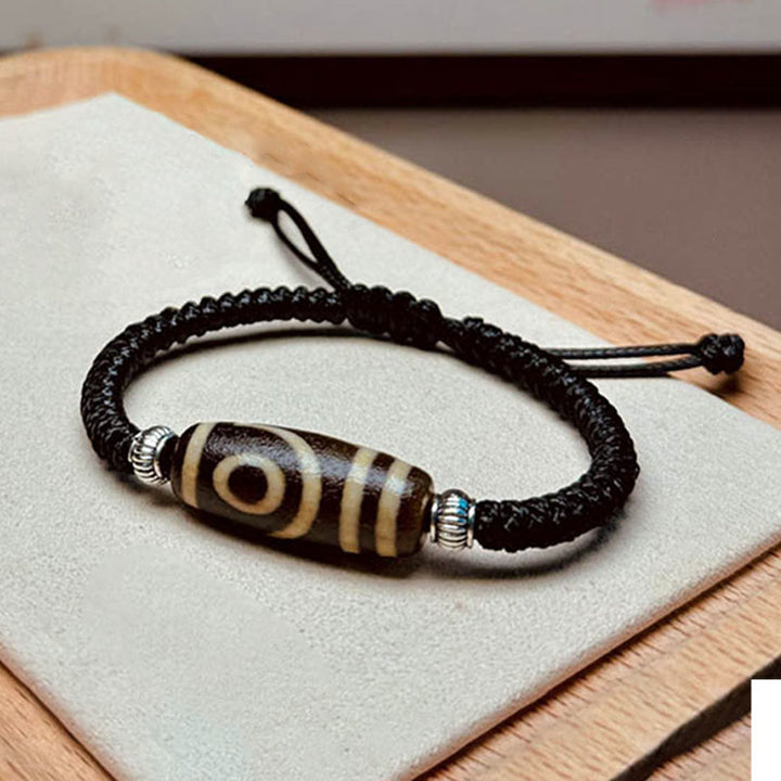 Buddha Stones Tibetano Perlina Dzi a nove occhi Perlina Dzi a tre occhi Braccialetto di corda di protezione della ricchezza