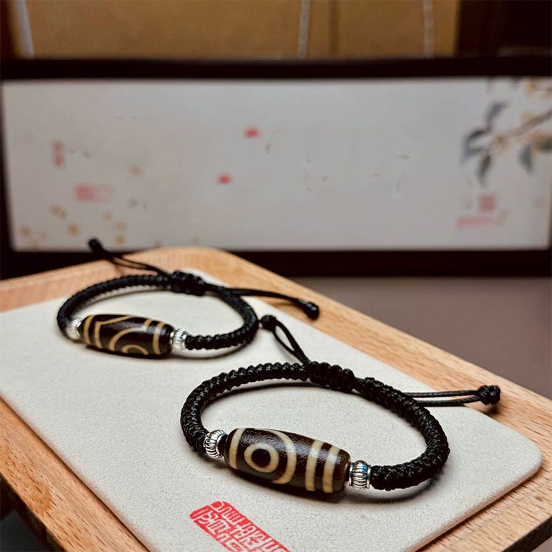Buddha Stones Tibetano Perlina Dzi a nove occhi Perlina Dzi a tre occhi Braccialetto di corda di protezione della ricchezza