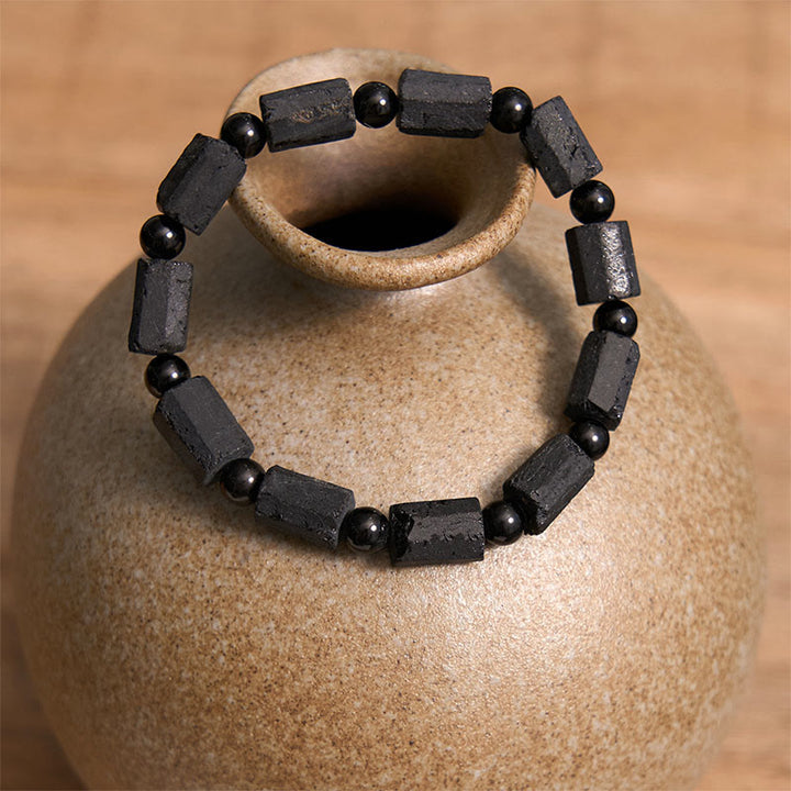 Bracciale della saggezza in tormalina nera Buddha Stones