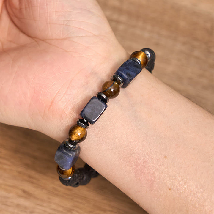 Braccialetto di supporto in pietra lavica con vari cristalli Buddha Stones