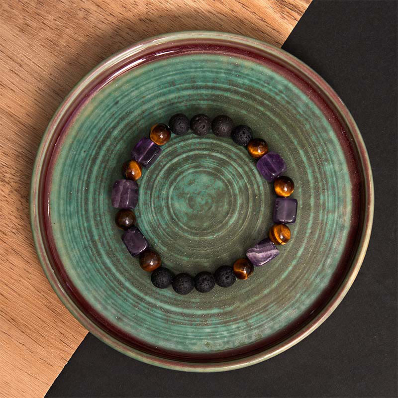 Braccialetto di supporto in pietra lavica con vari cristalli Buddha Stones