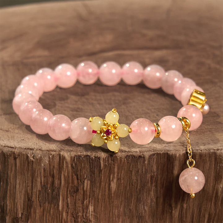 Braccialetto Buddha Stones con fiore di citrino e cristallo rosa