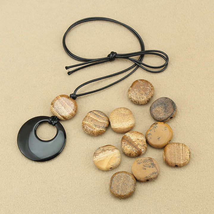 Buddha Stones Ossidiana nera Liuli Picture Stone Collana pendente in rame