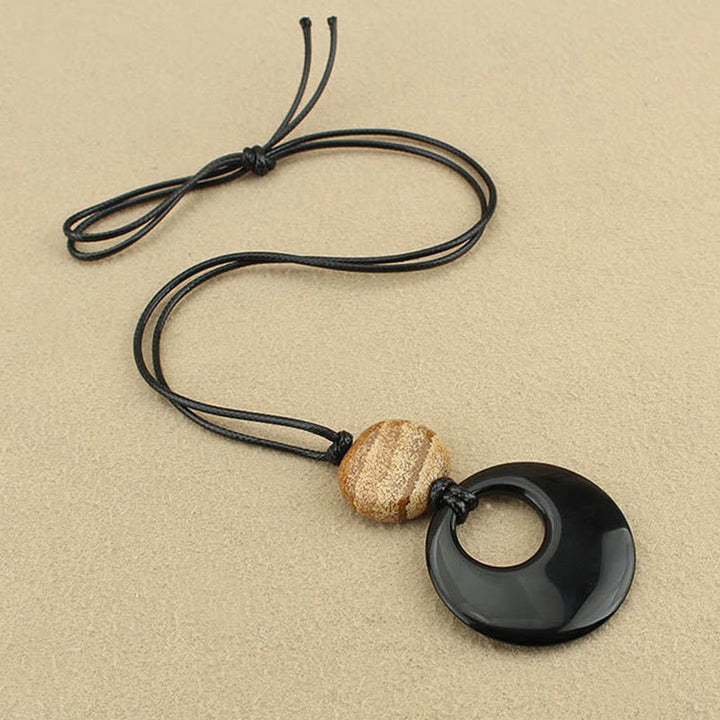Buddha Stones Ossidiana nera Liuli Picture Stone Collana pendente in rame