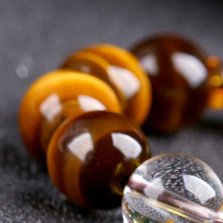 Braccialetto del coraggio dell'occhio di tigre dello zodiaco cinese Buddha Stones