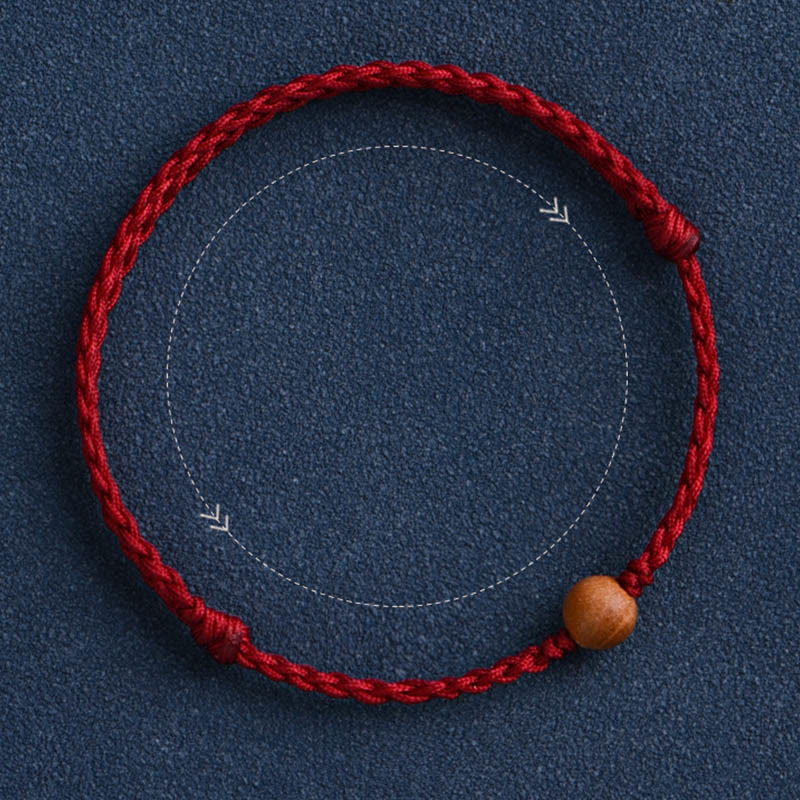 Bracciale intrecciato con perline di legno di pesca naturale Buddha Stones che allontanano gli spiriti maligni