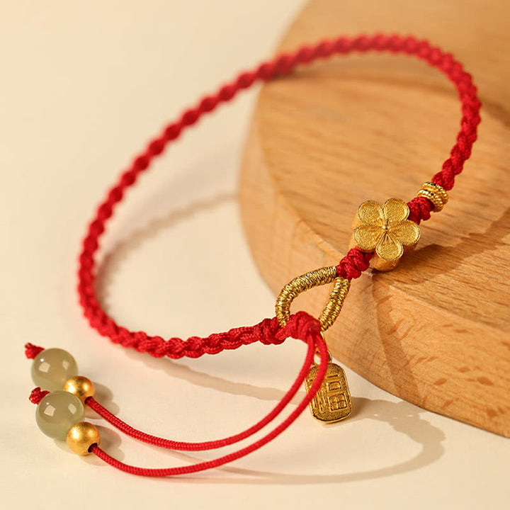 Braccialetto portafortuna con ciondolo a forma di carattere Fu in giada Hetian con Buddha Stones e piccoli fiori di pesco