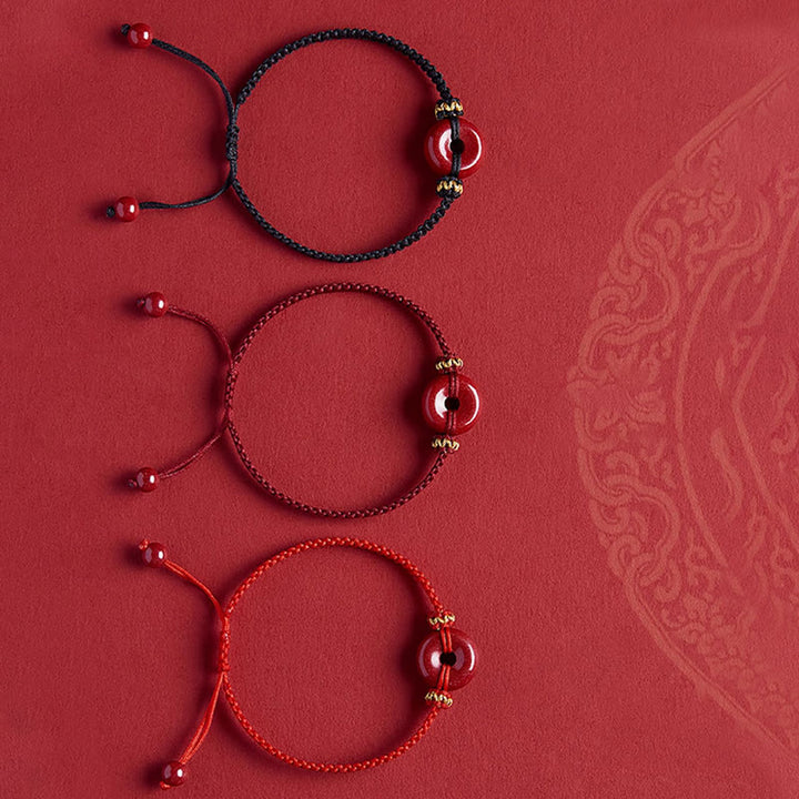 Braccialetto intrecciato con fibbia rotonda per la pace in cinabro fatto a mano Buddha Stones