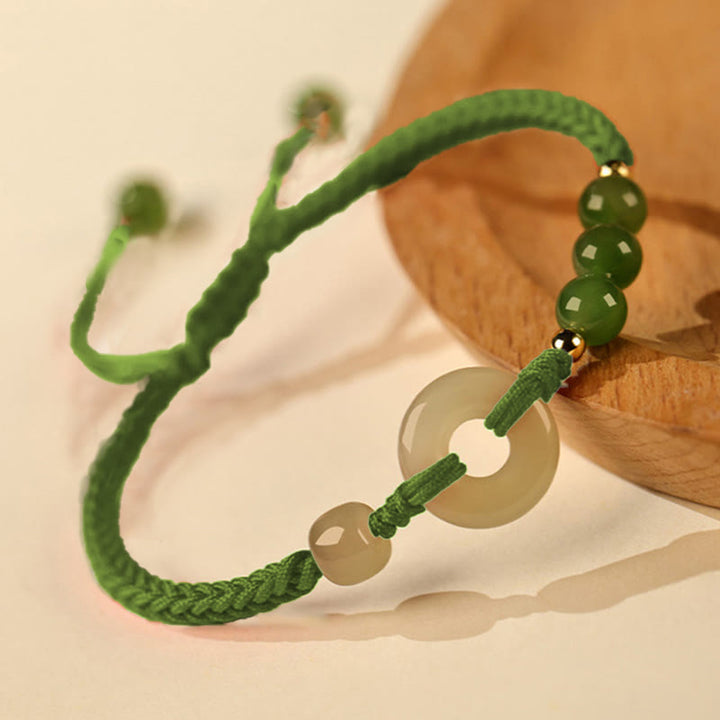 Buddha Stones Pulsera de protección de la suerte con hilo rojo y hebilla de paz de jade hetiano natural