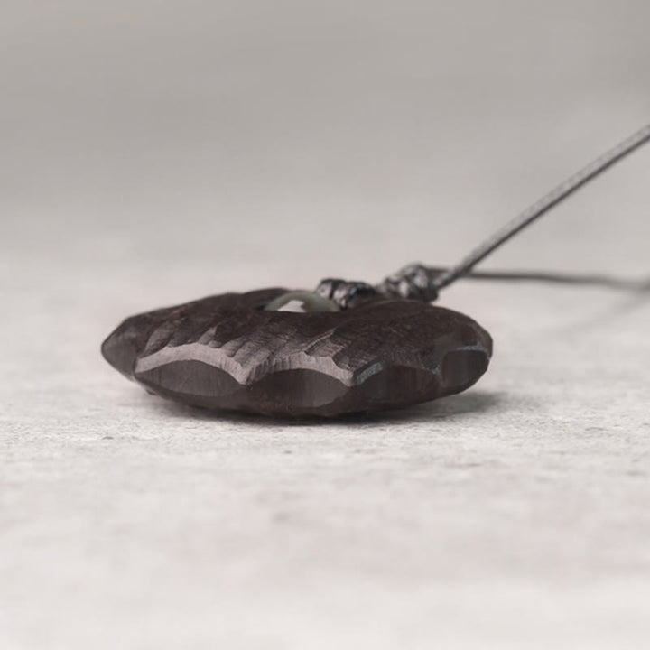 Collana pendente Buddha Stones in legno di ebano e ossidiana di forma irregolare, pace e calma