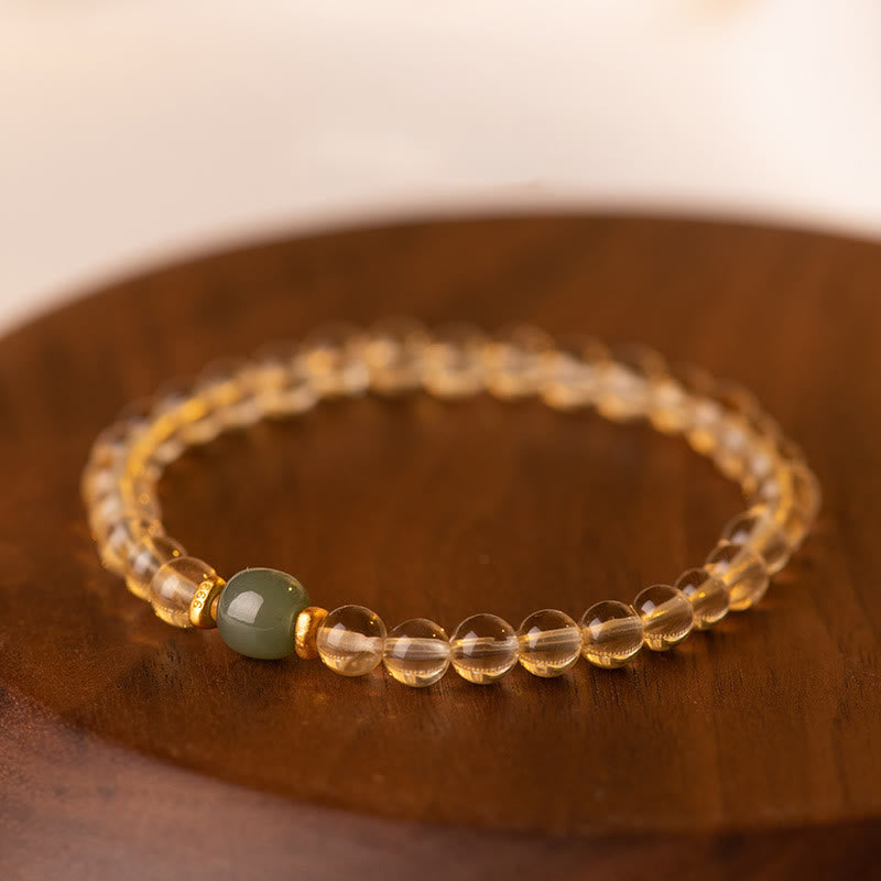 Braccialetto della prosperità con piccole perle di giada citrina e Buddha Stones