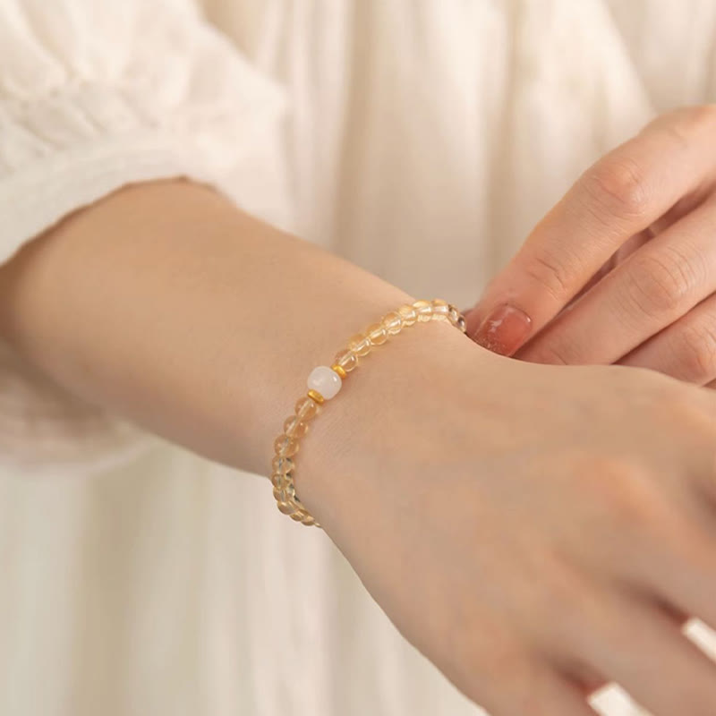 Braccialetto della prosperità con piccole perle di giada citrina e Buddha Stones