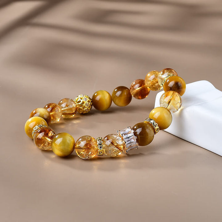 Braccialetto di forza e coraggio con perle di occhio di tigre naturale e citrino Buddha Stones