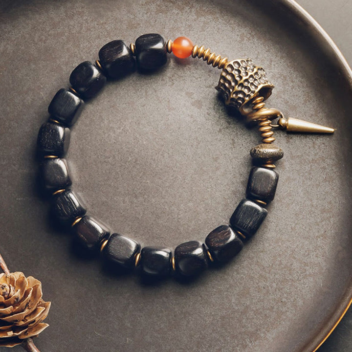 Braccialetto della pace in agata rossa, in legno di ebano e rame, in ottone Buddha Stones