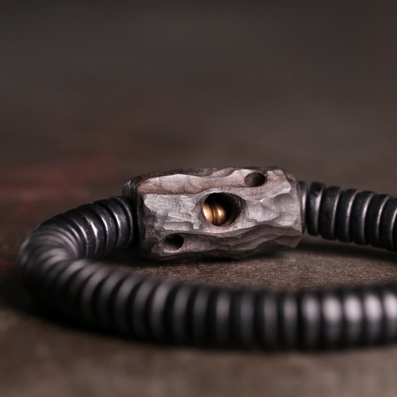 Bracciale Buddha Stones in legno di ebano, rame e ottone con fori per l'equilibrio - image 2