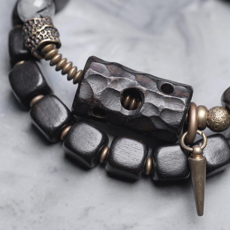 Braccialetto con bilanciere a doppio giro in ottone e rame, in legno di ebano e quarzo rutilato nero Buddha Stones
