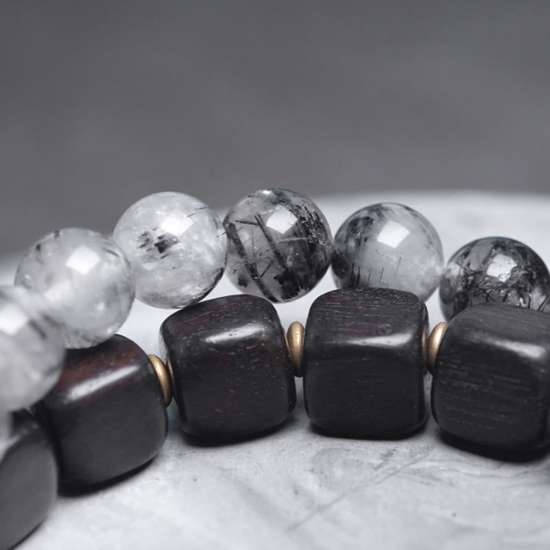 Braccialetto con bilanciere a doppio giro in ottone e rame, in legno di ebano e quarzo rutilato nero Buddha Stones