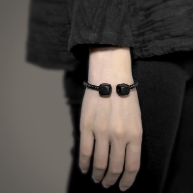 Braccialetto di equilibrio a cubo in legno di sandalo verde e legno di ebano Buddha Stones