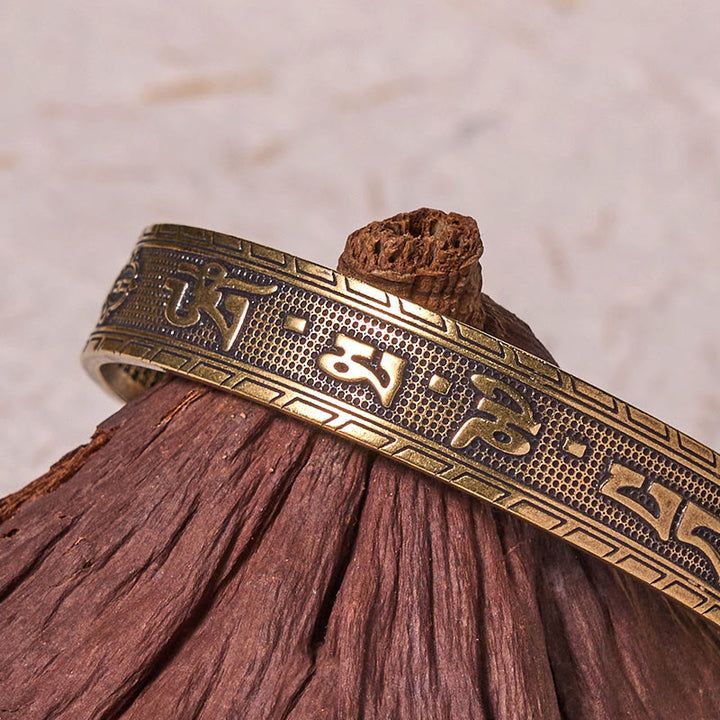 Buddha Stones Sei parole vere 'om Mani Padme Hum' Sutra del cuore Braccialetto in rame e ottone, fortuna e saggezza