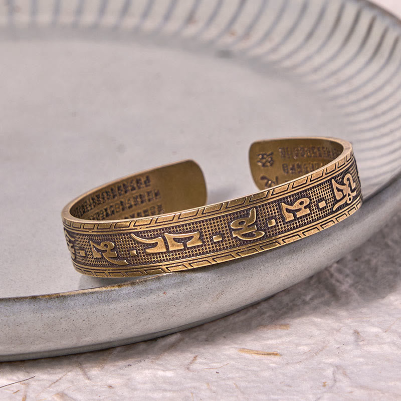 Buddha Stones Sei parole vere 'om Mani Padme Hum' Sutra del cuore Braccialetto in rame e ottone, fortuna e saggezza