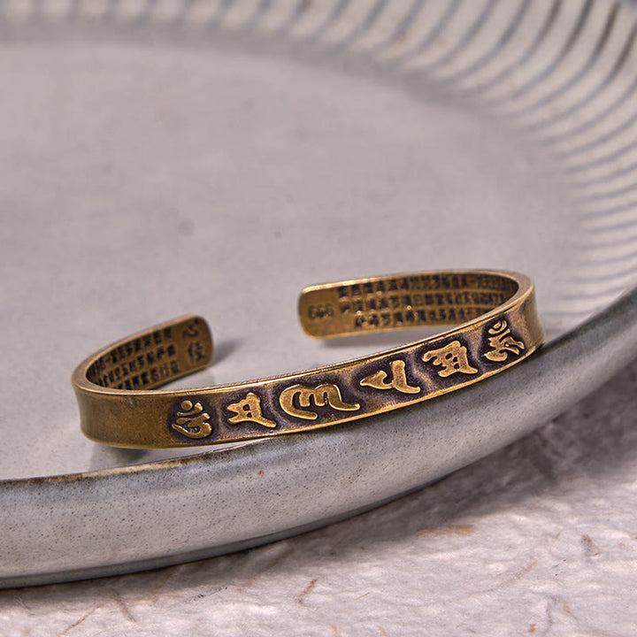 Buddha Stones Sei parole vere 'om Mani Padme Hum' Sutra del cuore Rame Ottone Saggezza Pace Bracciale rigido