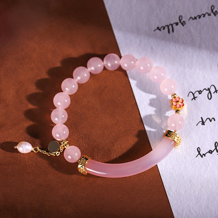 Braccialetto a metà polsino in perle di calcedonio blu e cristallo rosa Buddha Stones