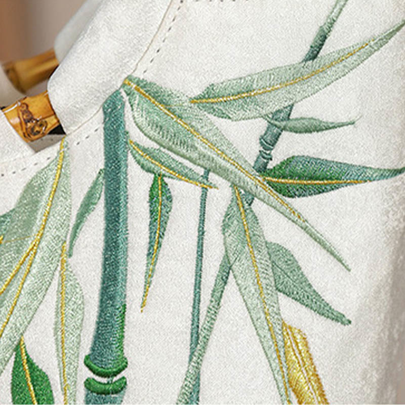 Borse con nappine e manici in bambù ricamati con Buddha Stones