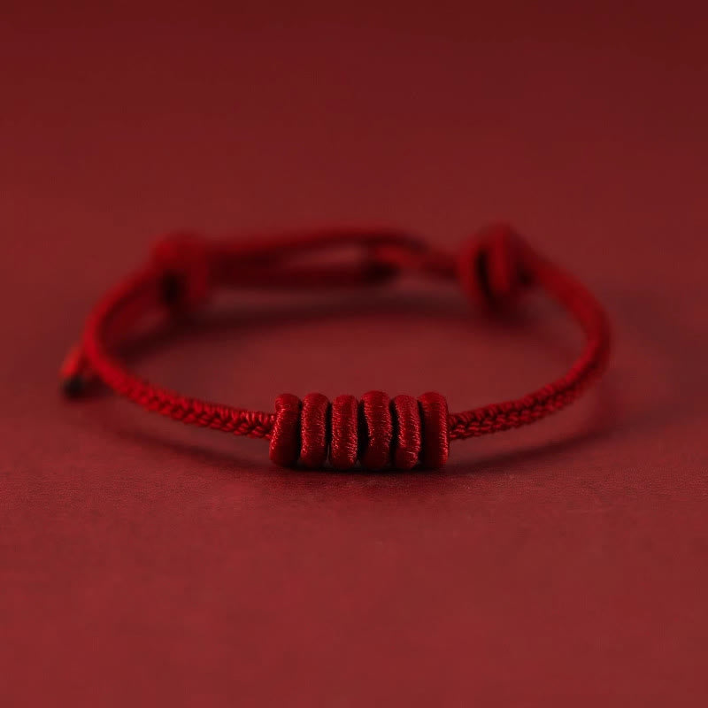 Braccialetto di forza con corda rossa a otto fili Buddha Stones