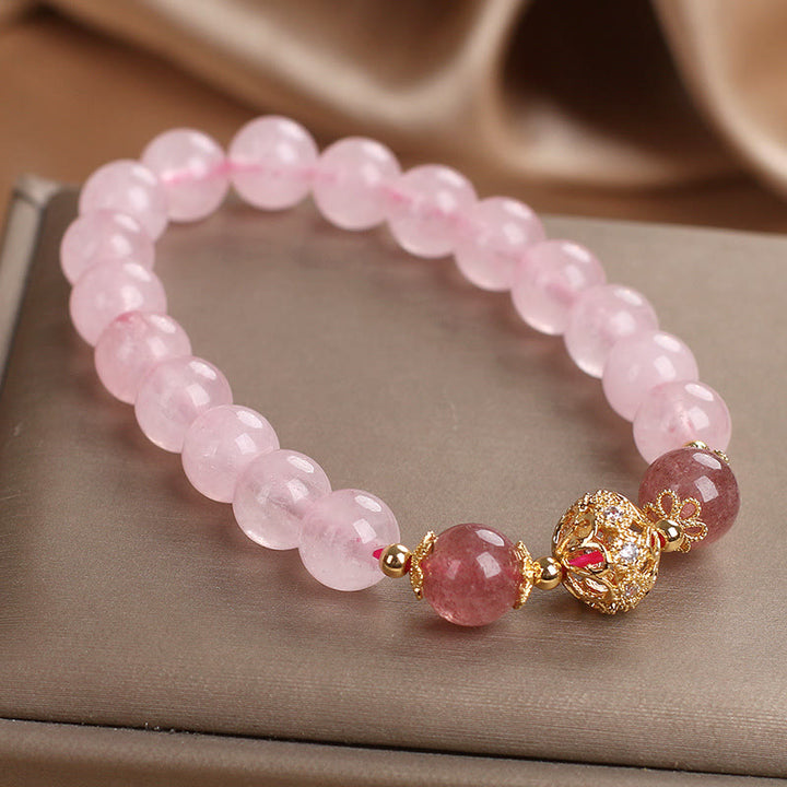 Bracciale Buddha Stones con cristallo rosa e quarzo fragola Love