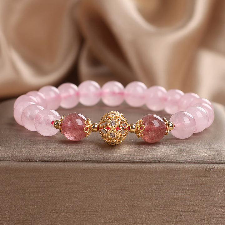 Bracciale Buddha Stones con cristallo rosa e quarzo fragola Love