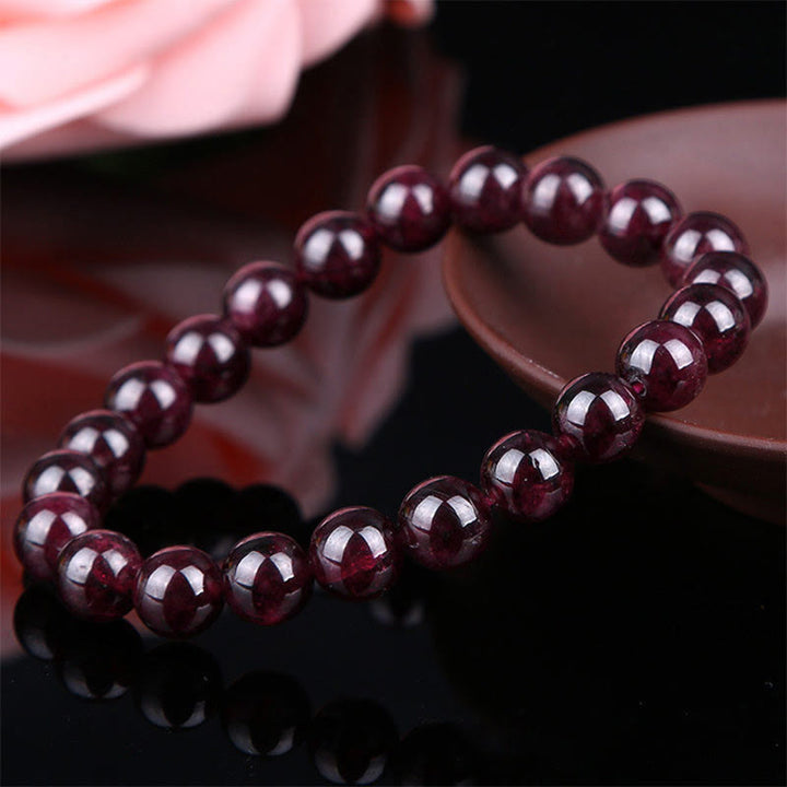Braccialetto Buddha Stones Natural Garnet Bead Passion