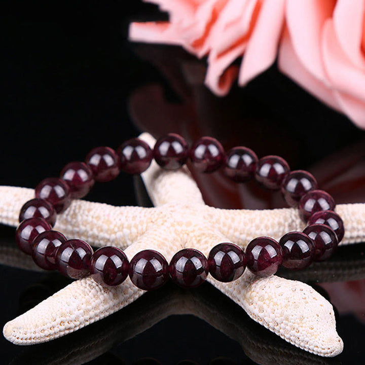 Braccialetto Buddha Stones Natural Garnet Bead Passion