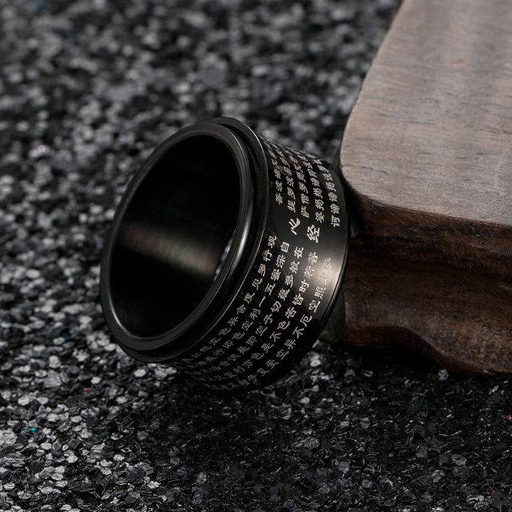 Buddha Stones Scritture in miniatura tibetane Cuore Sutra Anello in acciaio al titanio Spinner Balance