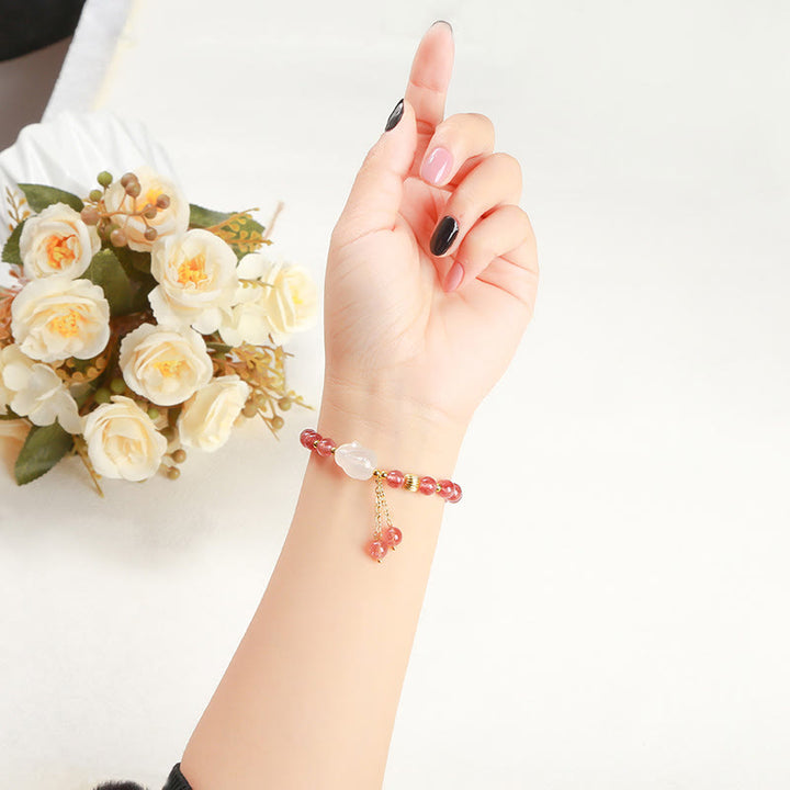 Braccialetto di guarigione naturale in quarzo fragola e agata con coniglio Buddha Stones