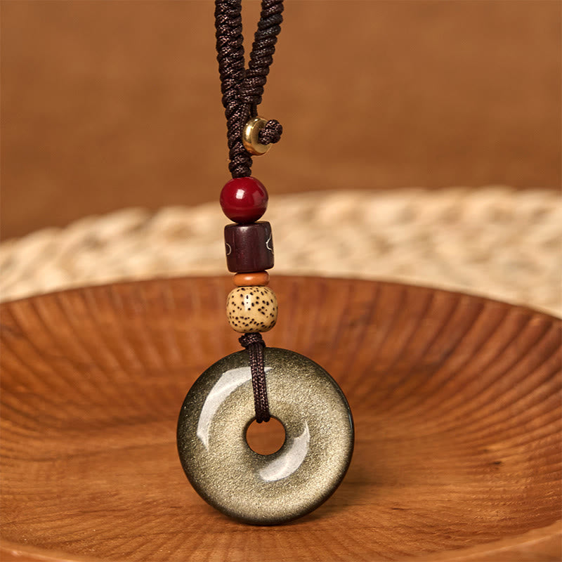 Buddha Stones Oro Naturale Lucente Ossidiana Fibbia della Pace Rafforza Portachiavi